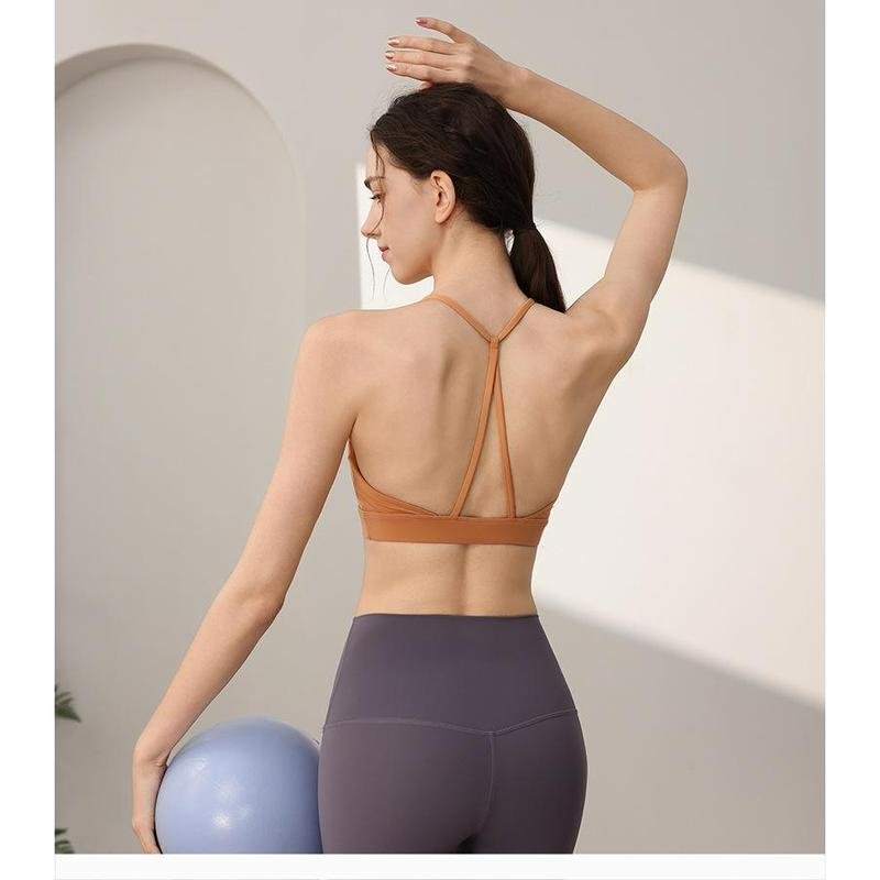 ฤดูร้อน ขายดีที่สุด SHQX สปอร์ตบรา สำหรับผู้หญิง กีฬายิม เสื้อออกกำลังกาย ป้องกันการกระเด้ง ระบายอากาศ แห้งไว เหมาะสำหรับเล่นโยคะ เสื้อกั๊กเทรนนิ่ง Racerback สำหรับวิ่ง